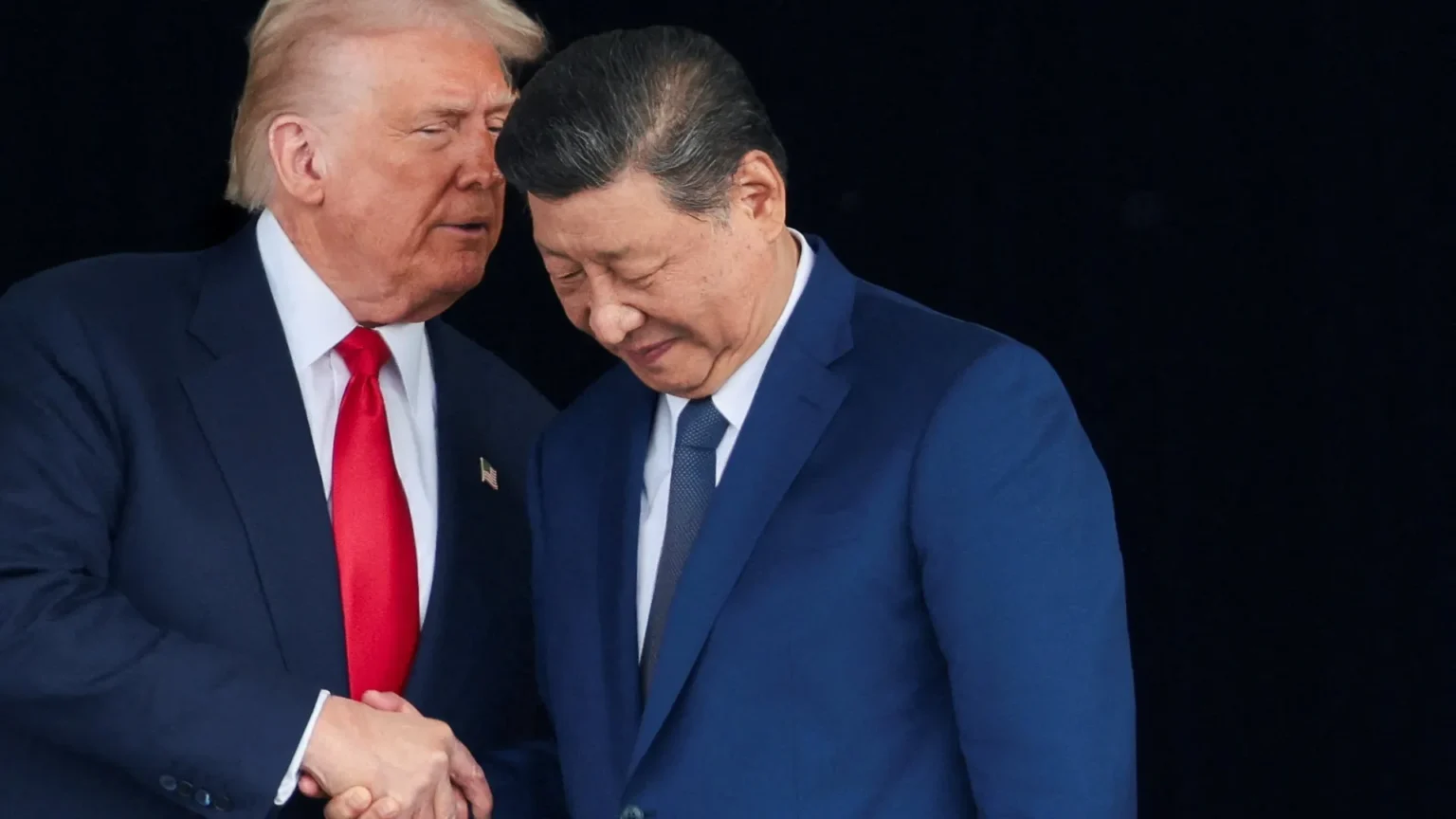 Trump, Xi meet in person as US and China move to ease trade tensions