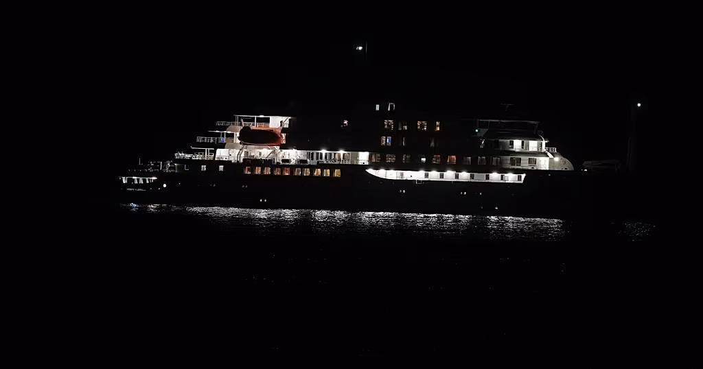 Passengers plead for clarity as virus-hit cruise remains stranded off Cape Verde